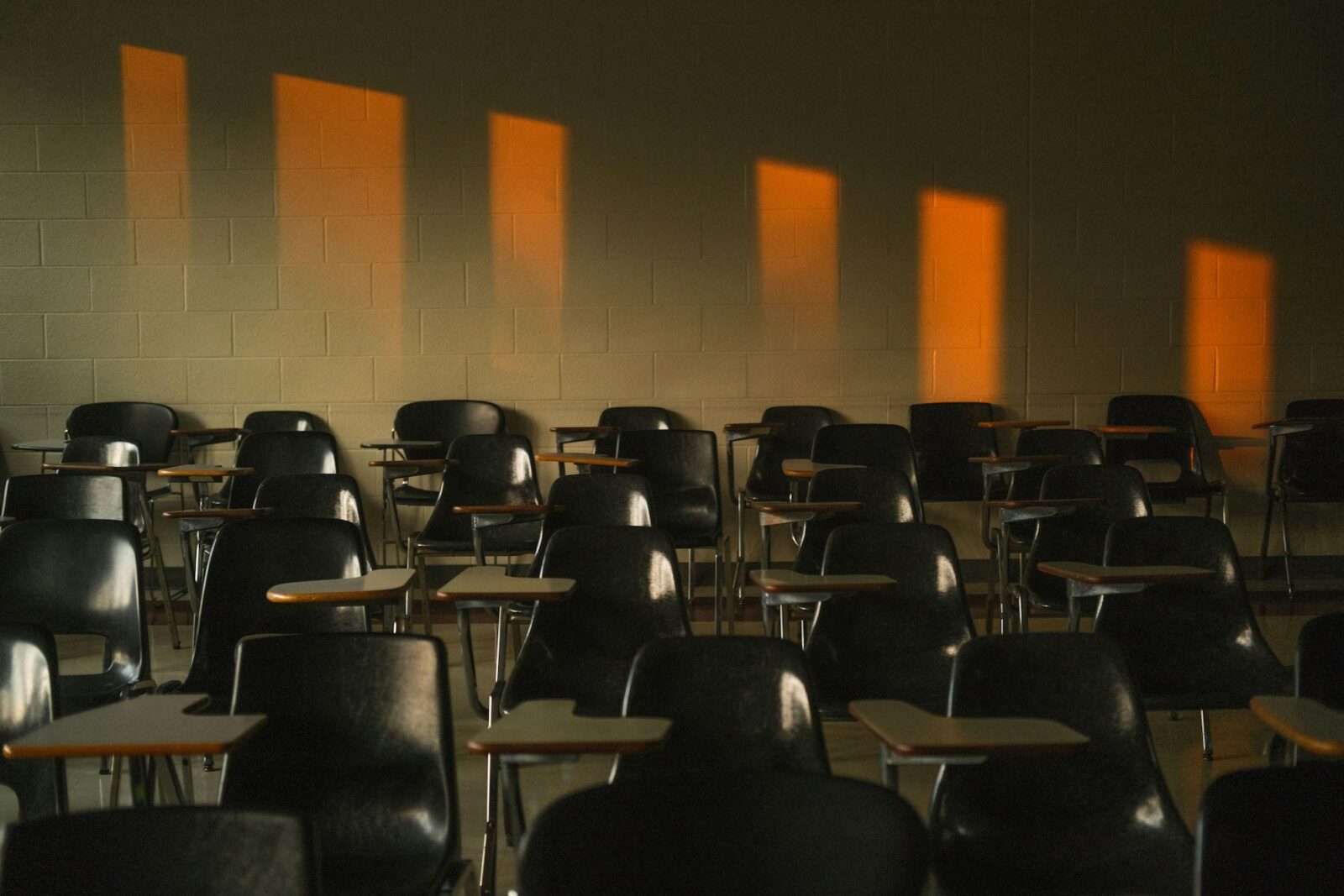 EWS admissions dates extended to October 15 Empty classroom with sunlight shining through the windows