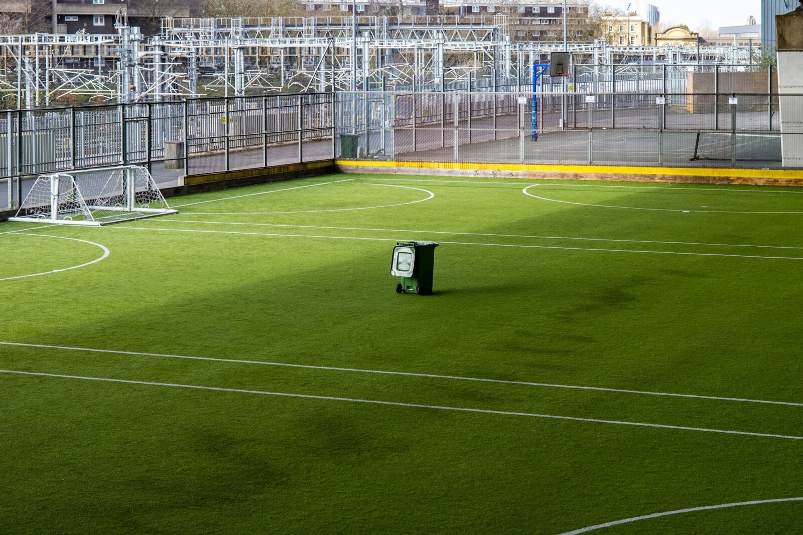 UK to provide free covid-19 test kits to its school-going population A green and white football goal standing on an empty pitch