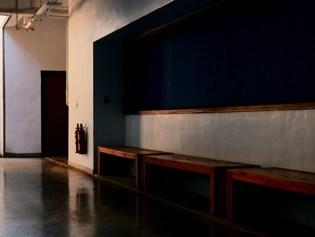 Rajasthan Chief Minister’s Nod to Online Students Register Wooden benches below a long blackboard in a teaching hall
