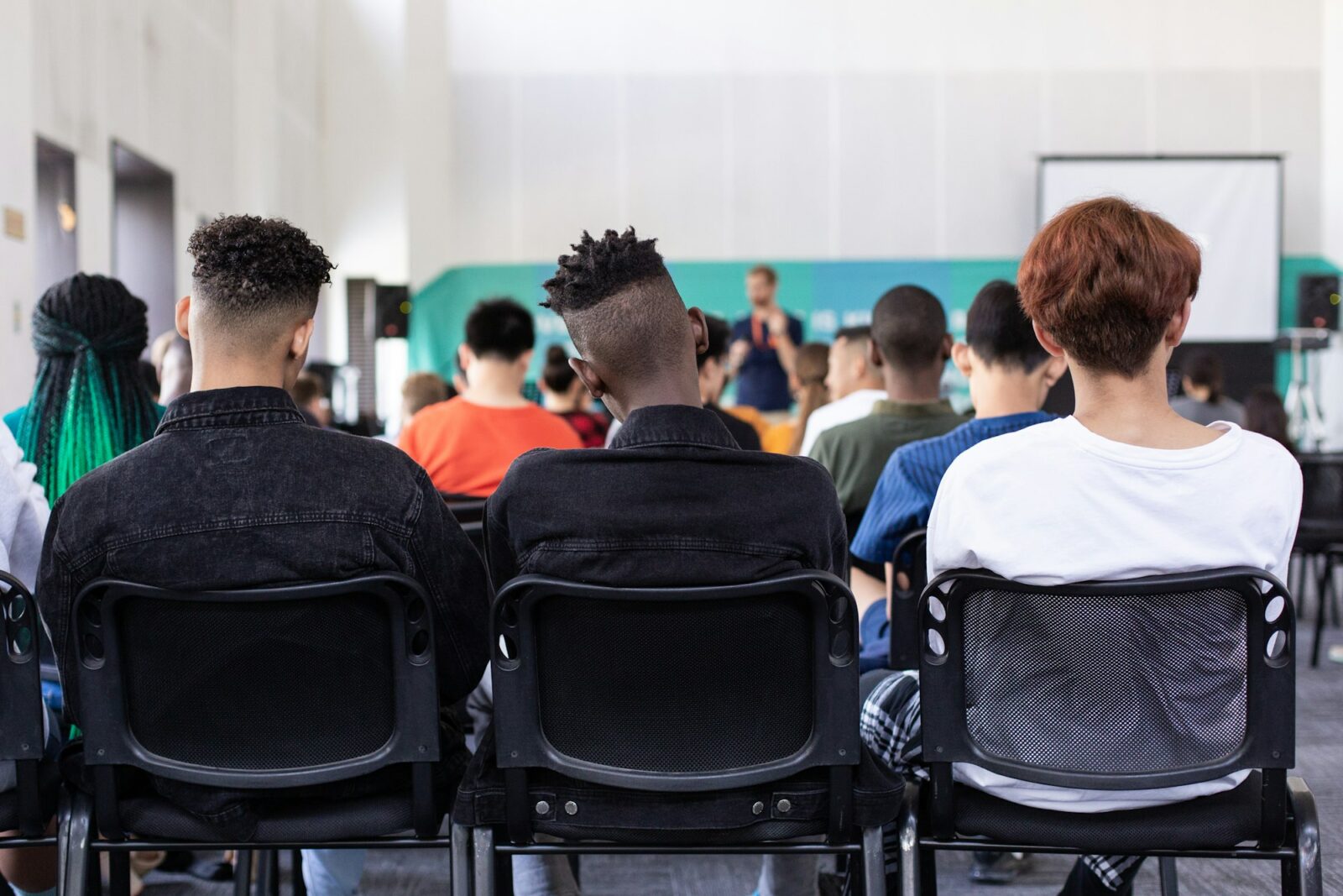 Casteism Invading The Education Sector Students sitting on chairs at the back of a classroom