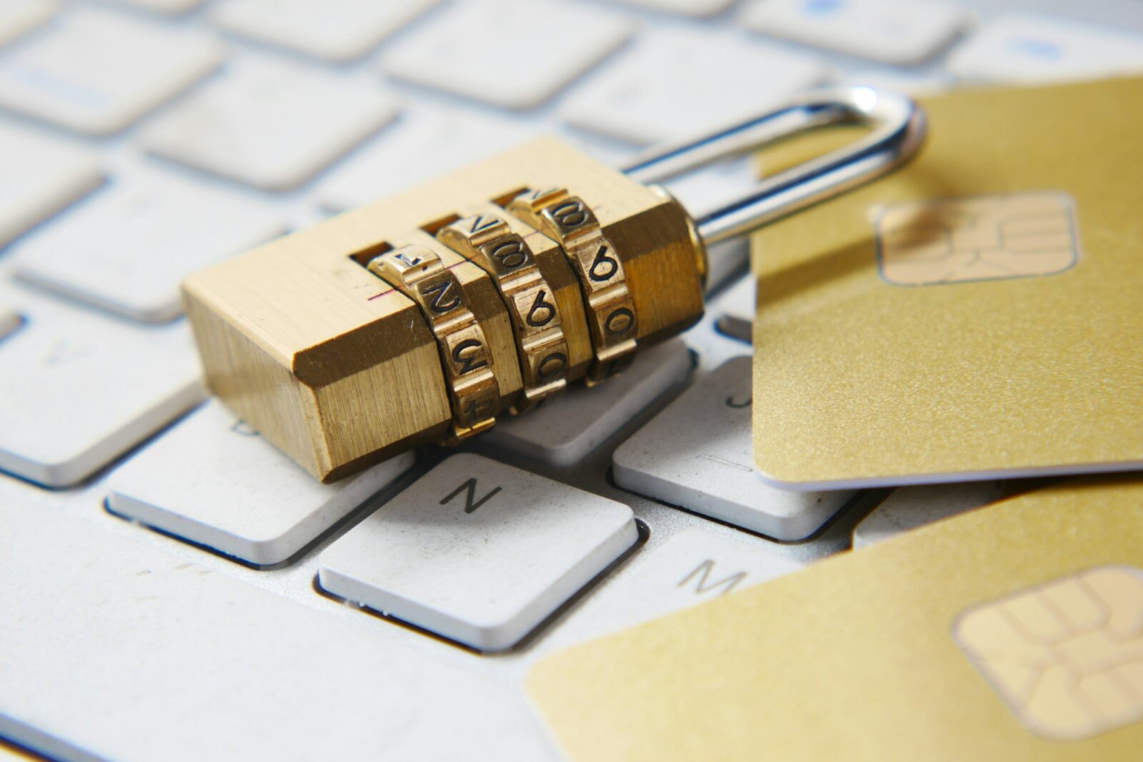Student data privacy and security Golden padlock resting on top of a computer keyboard